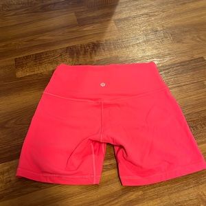 Lululemon lipgloss pink, 4 inch inseam biker shorts. Barely worn.